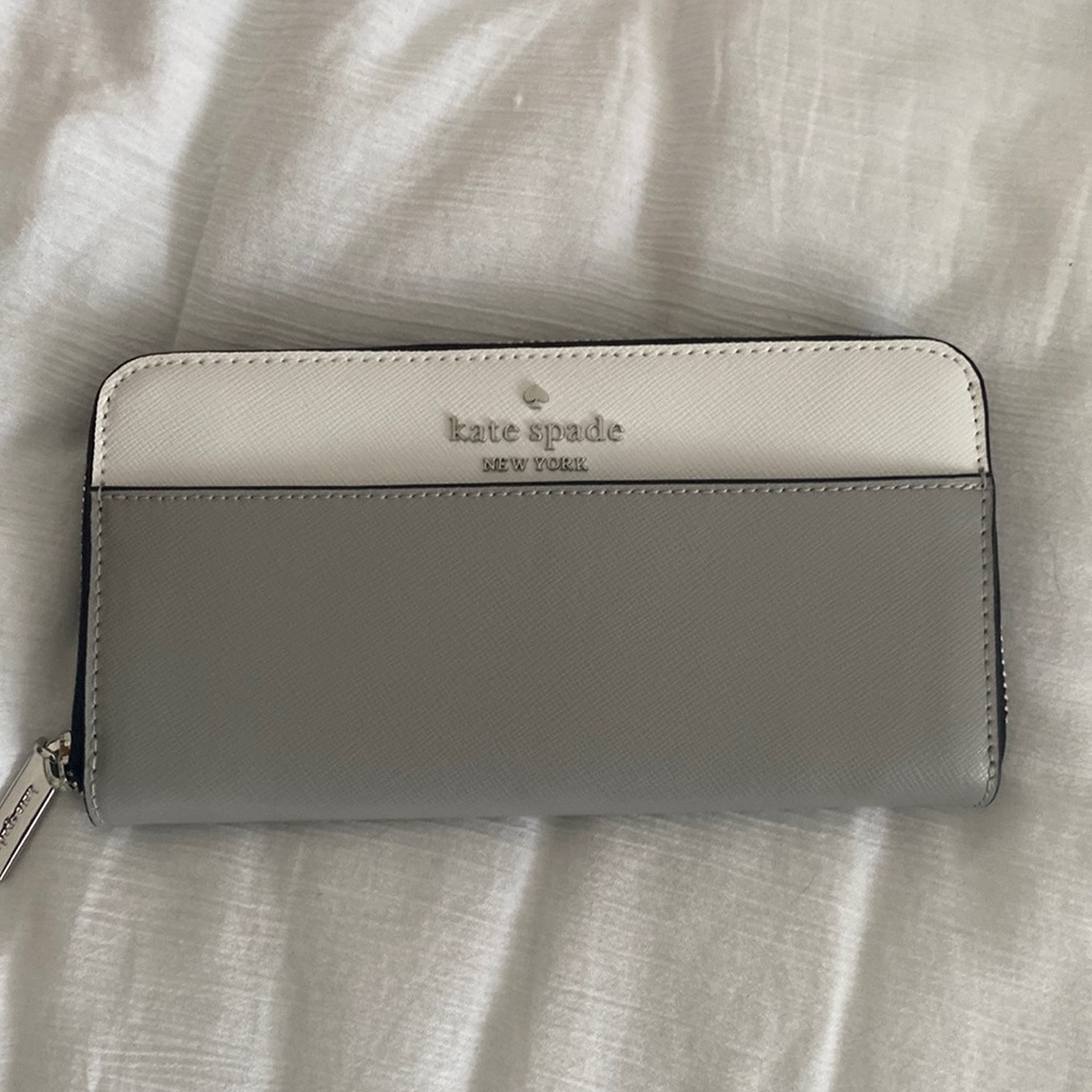Kate Spade gray, black, and white leather wallet